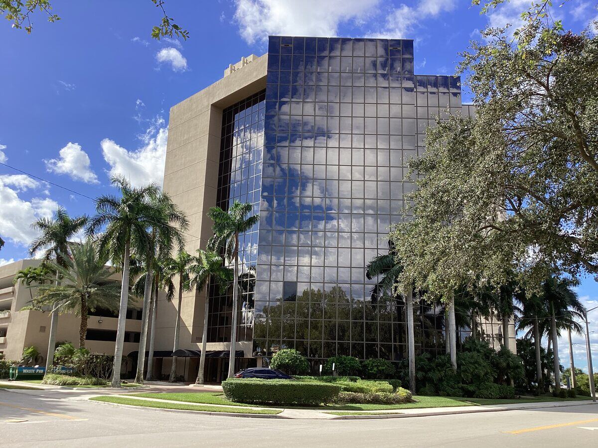 Commercial office tower with mirrored glass facade