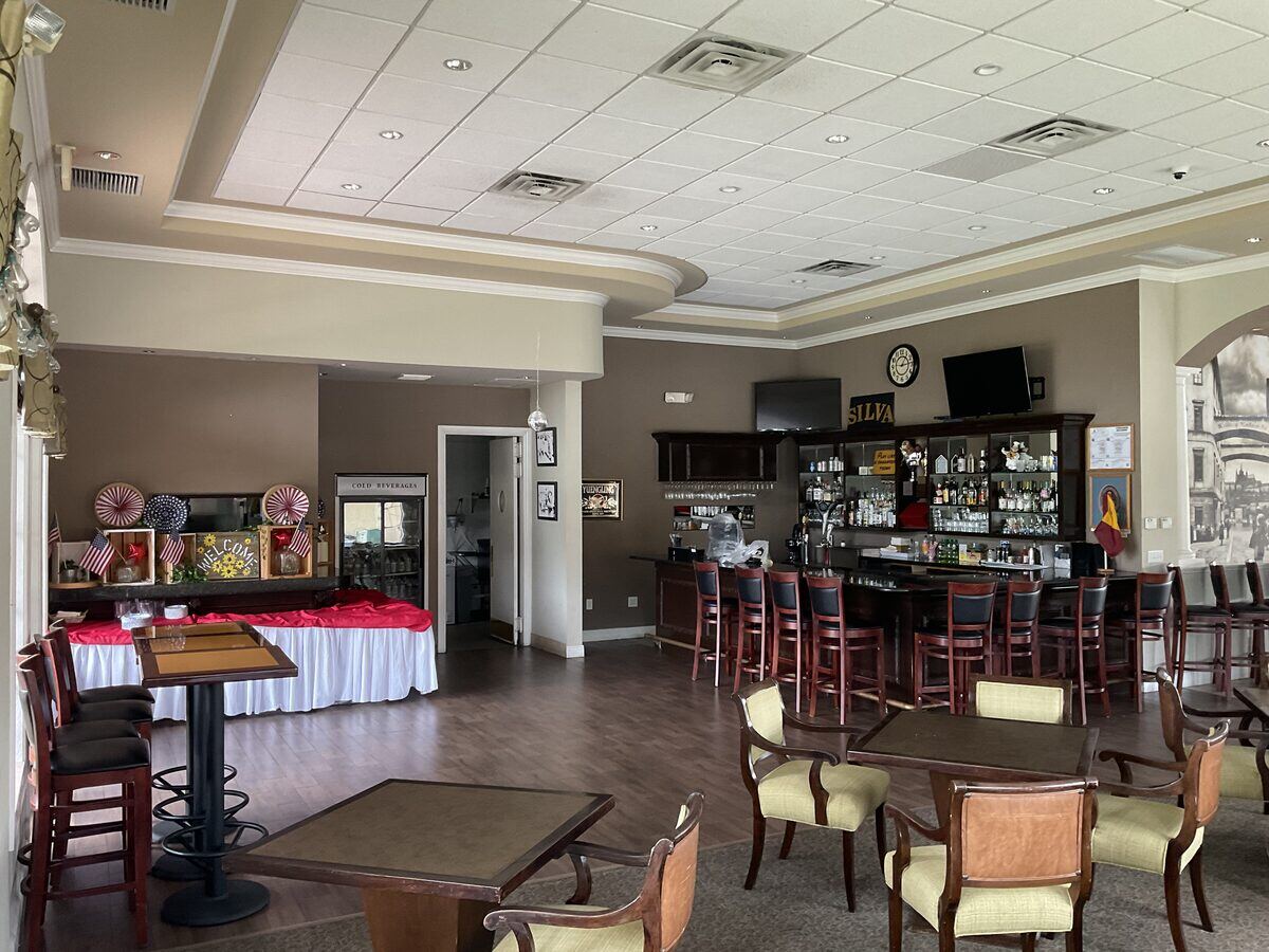 Bar and lounge interior with crown molding
