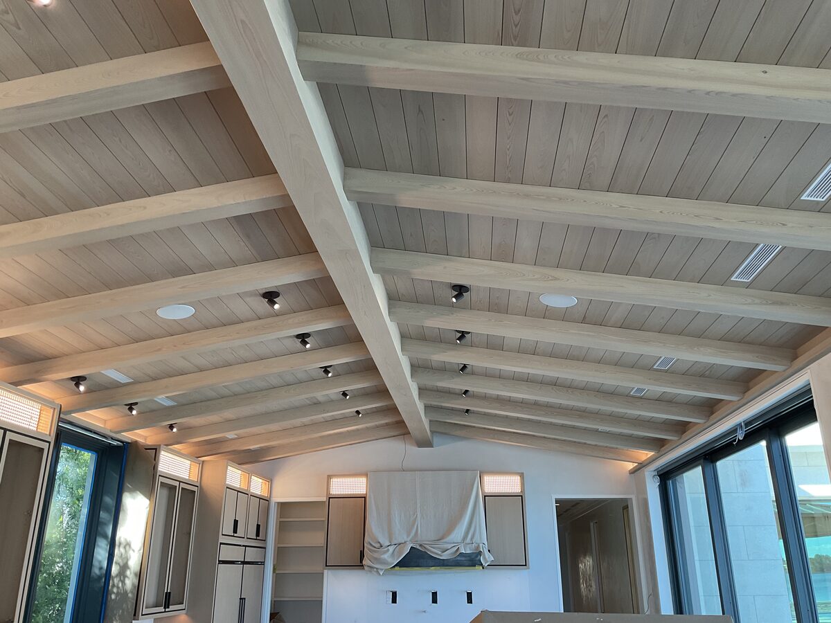 Vaulted beam ceiling with painted finish