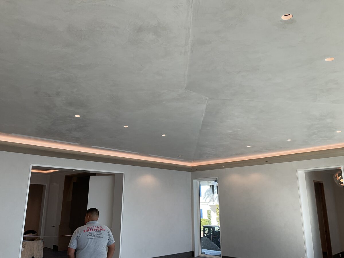 Venetian plaster ceiling with cove lighting