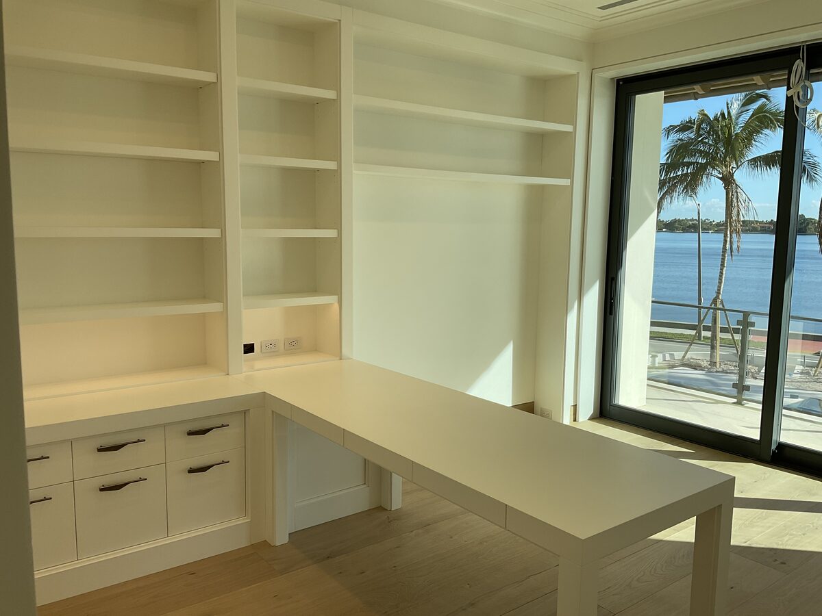 White built-in shelving with painted millwork