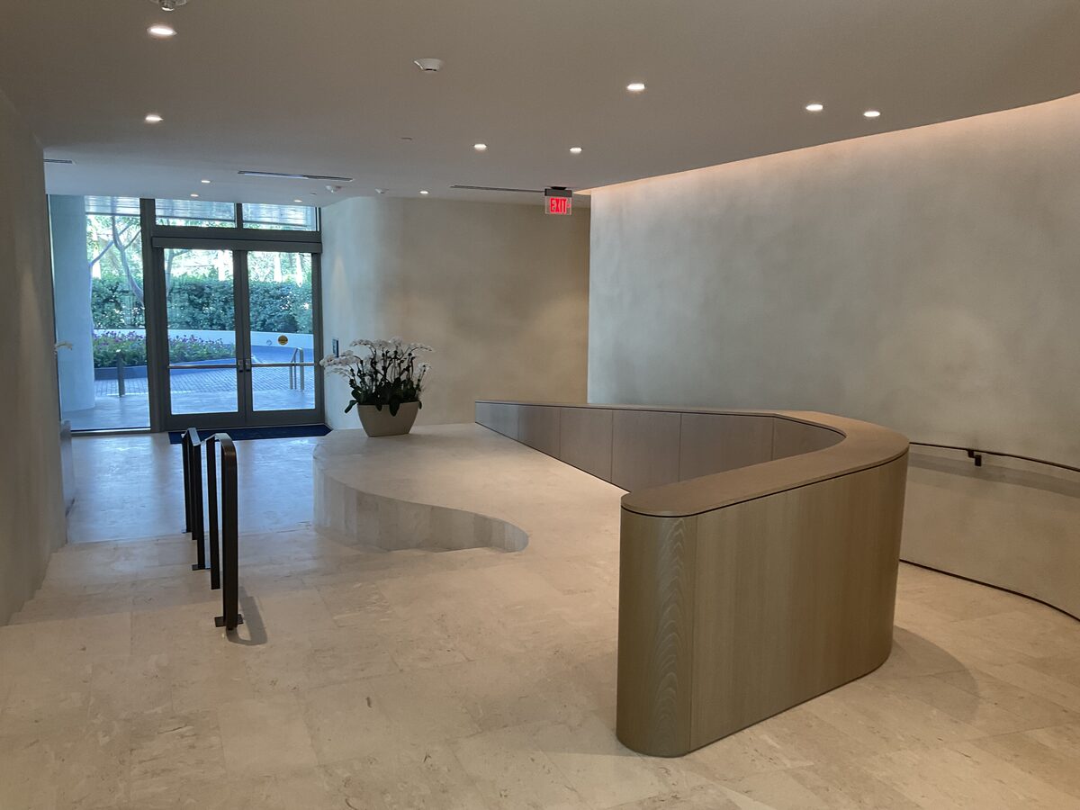 Commercial lobby with curved reception desk