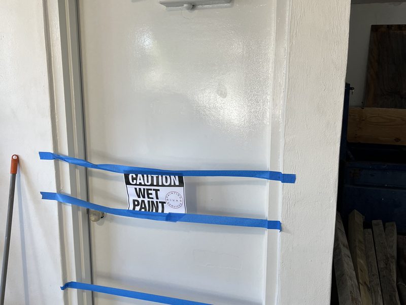 Door after refinishing, clean satin finish and crisp lines