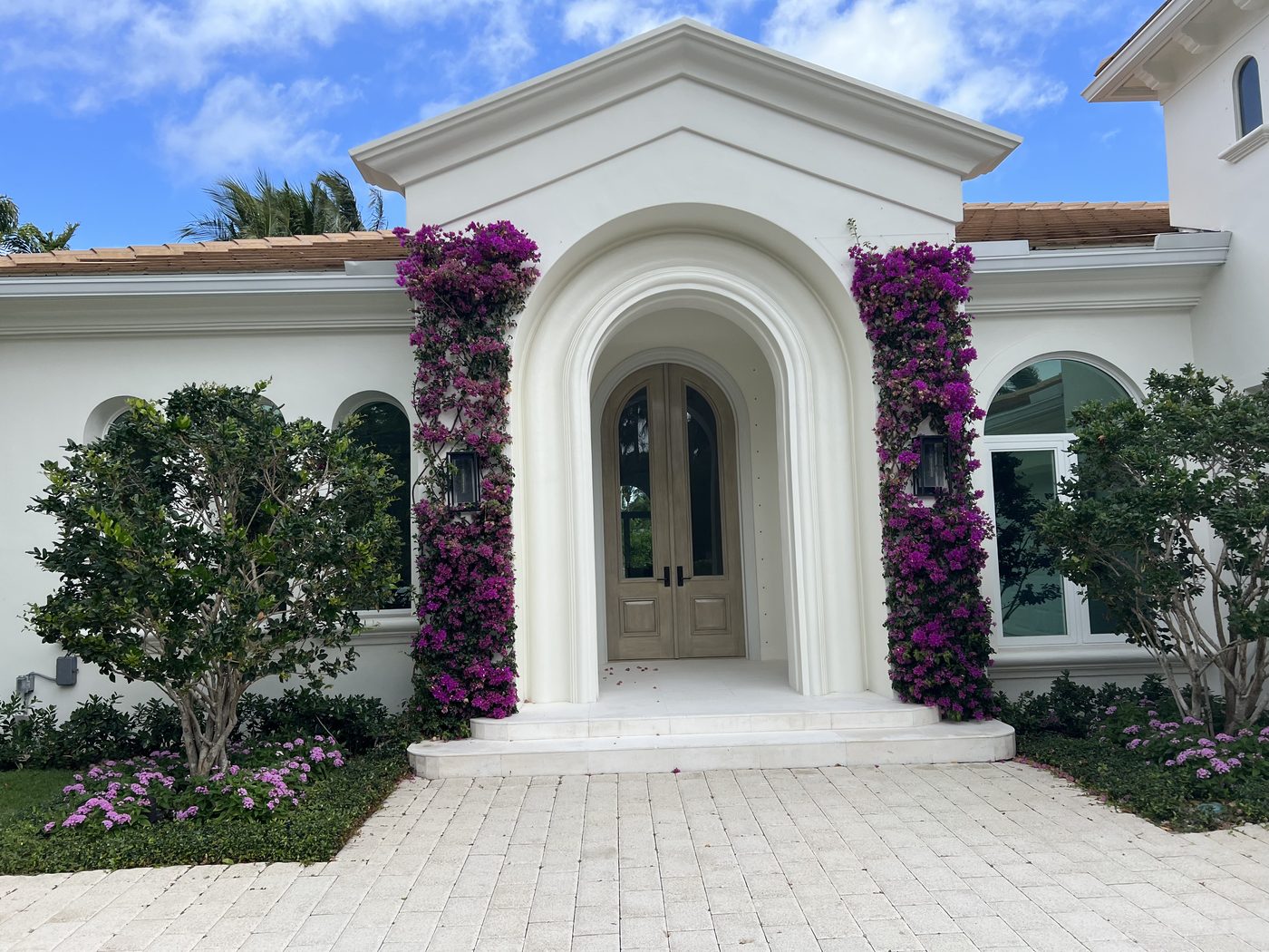 Mediterranean estate with bougainvillea, exterior repaint