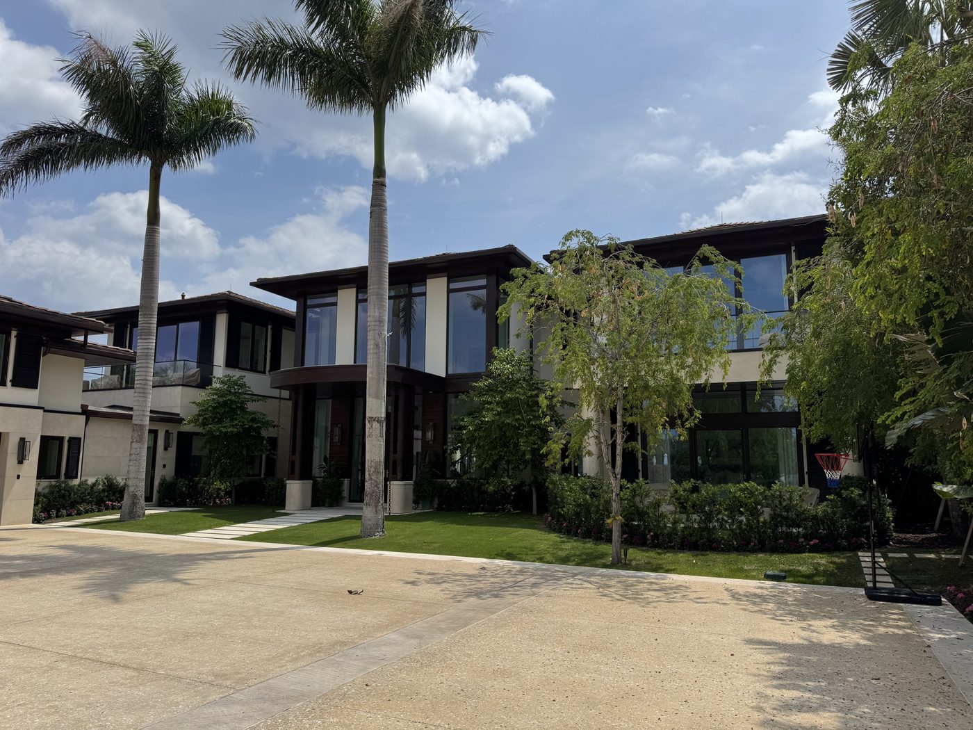Modern Palm Beach estate exterior, multi-story custom finish
