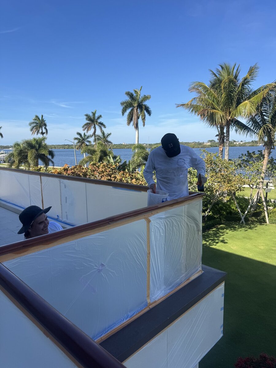 Rivas Painting crew on Palm Beach intracoastal estate grounds