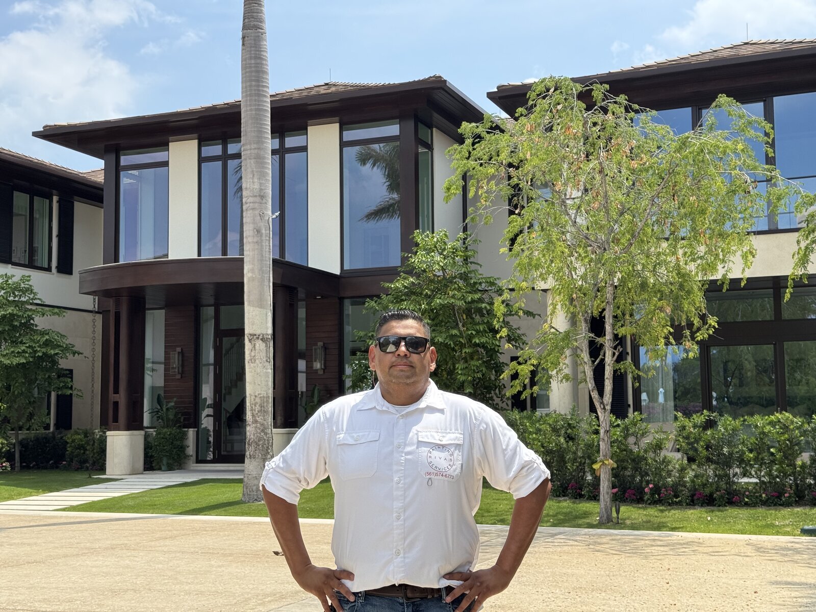 Luis Rivas on-site at a Palm Beach mansion exterior project